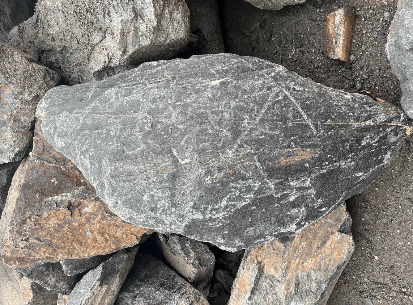 Black mica schist stone mined at Media Quarry.